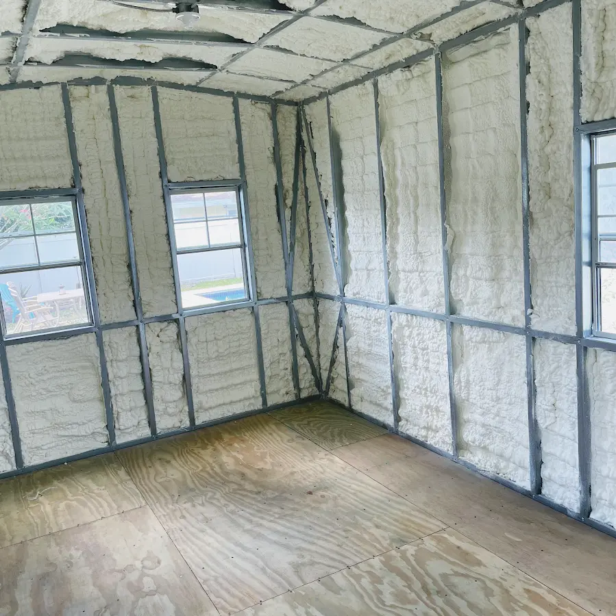 Closed-cell spray foam insulation applied to wall cavities in a residential project in Dothan